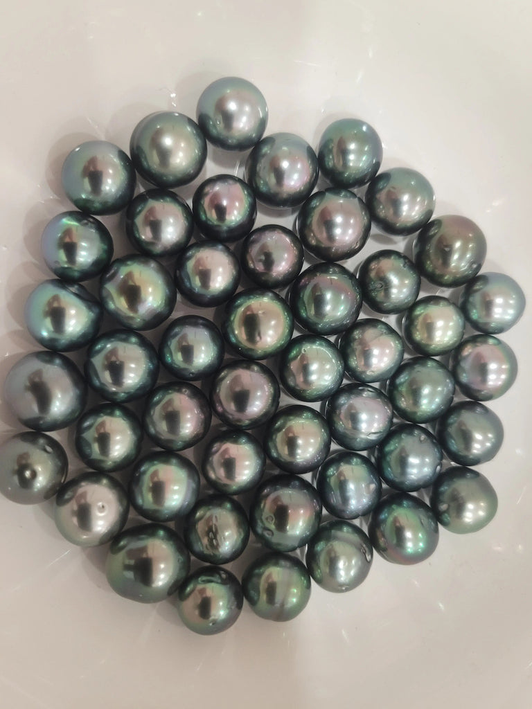 Dark green Tahitian pearls 10-11mm multiple pieces — natural body color