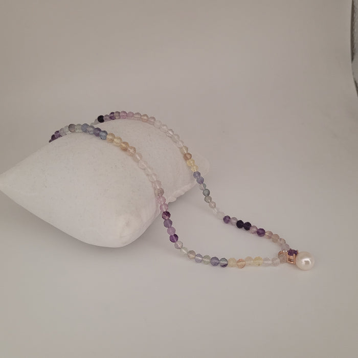 A Necklace of Amethyst stone,  Fluorite strand, Akoya Cultured Pearl, Diamond and 18K Gold