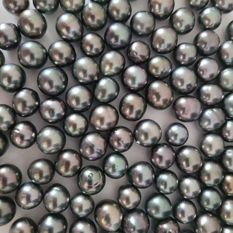 Loose dark Tahitian cultured pearls 10-11mm round (Pinctada margaritifera) — The South Sea Pearl